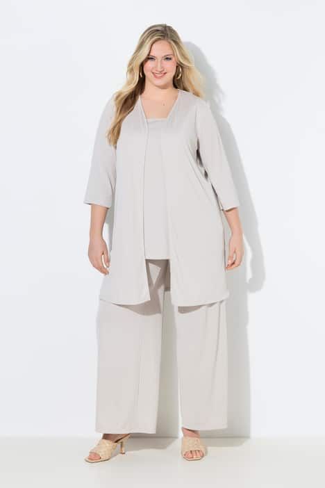 Gilet long en jersey côtelé. Coupe ouverte et encolure en V