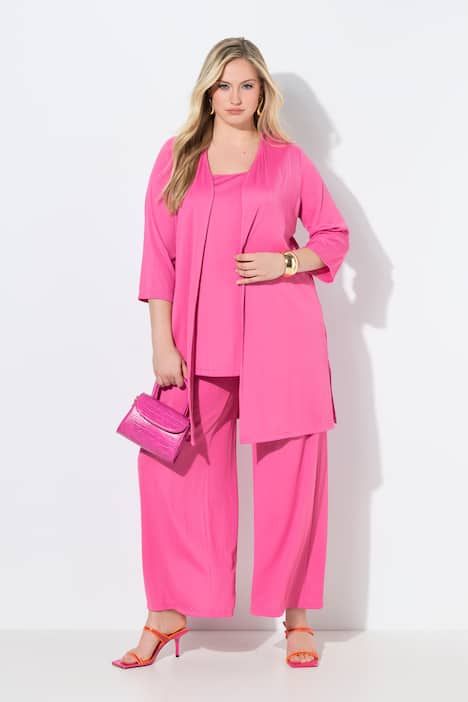 Gilet long en jersey côtelé. Coupe ouverte et encolure en V