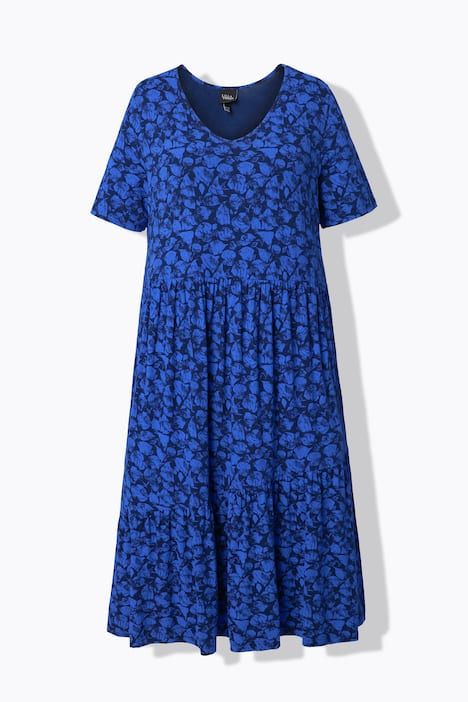 Robe en jersey. Coupe évasée avec volants. Décolleté V, manches courtes