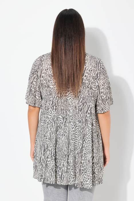 Blouse, motif animaux de la jungle. Décolleté carré et manches courtes. Coupe évasée