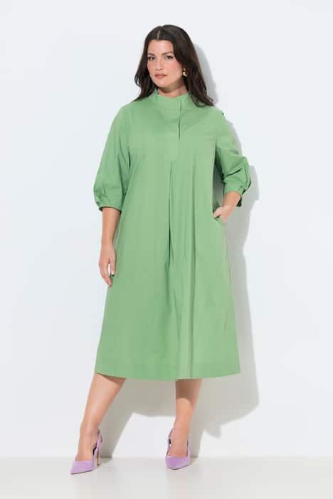 Robe Papertouch. Col montant, manches 3/4. Coupe évasée