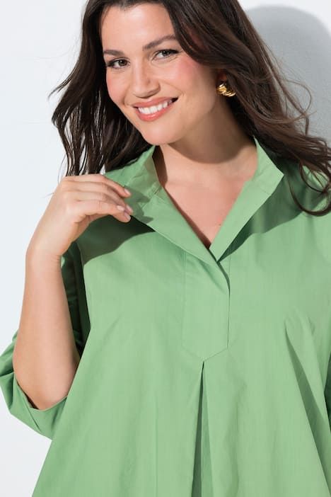 Robe Papertouch. Col montant, manches 3/4. Coupe évasée