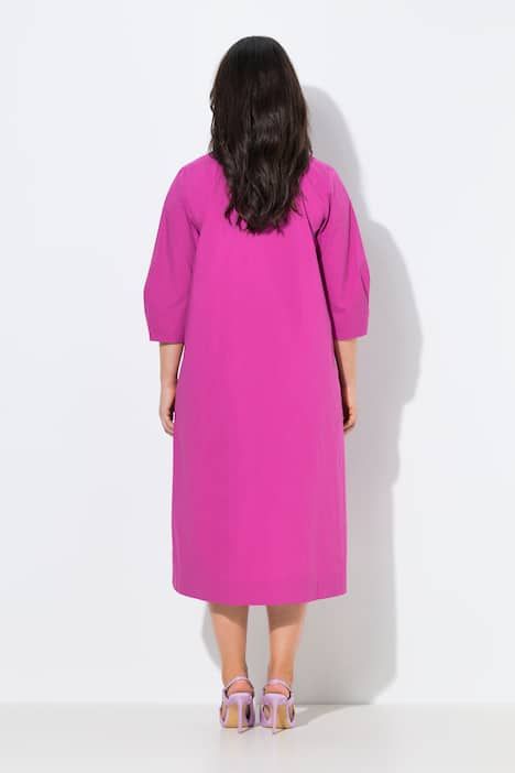 Robe Papertouch. Col montant, manches 3/4. Coupe évasée