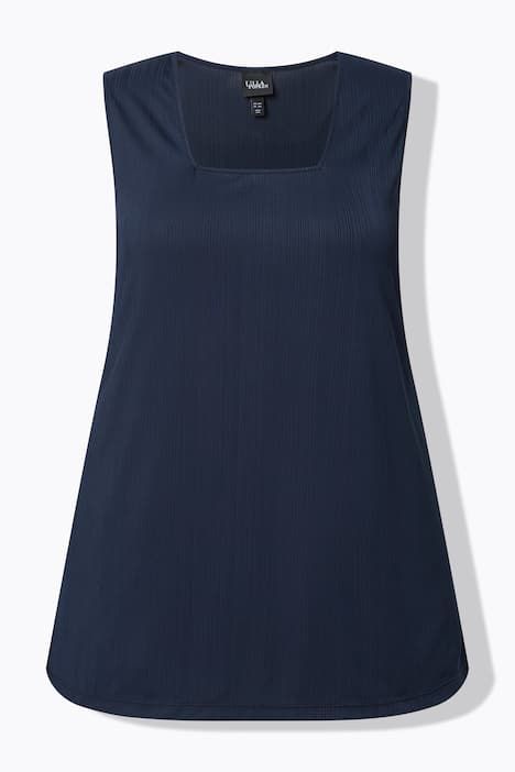 Débardeur côtelé. Décolleté carré. Bretelles larges. Coupe évasée