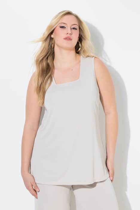 Débardeur côtelé. Décolleté carré. Bretelles larges. Coupe évasée