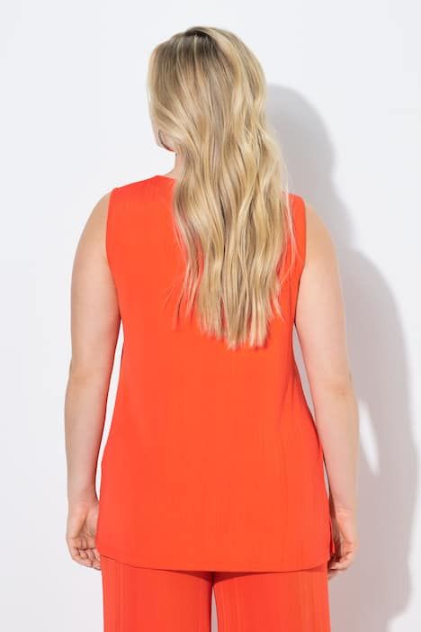 Débardeur côtelé. Décolleté carré. Bretelles larges. Coupe évasée