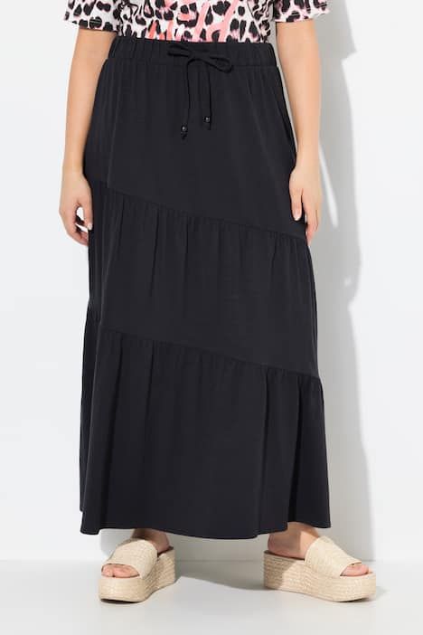 Jupe maxi en jersey. Volants. Taille élastique. Coupe évasée