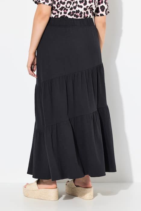 Jupe maxi en jersey. Volants. Taille élastique. Coupe évasée