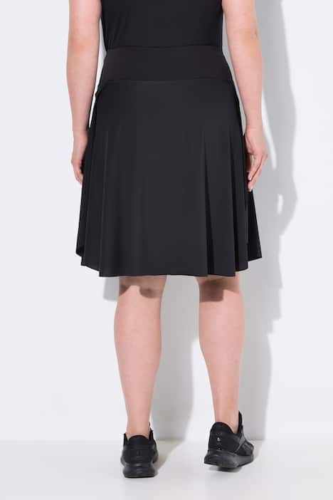 Jupe-short avec legging intégré. Taille élastique. Poches pour smartphone