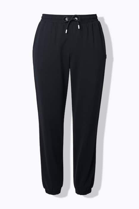 Pantalon de jogging, taille et bas de jambe élastiques, passepoil sur les côtés