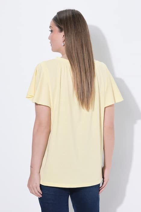 T-shirt à petits pois, décolleté en V et manches courtes chauve-souris, coupe évasée