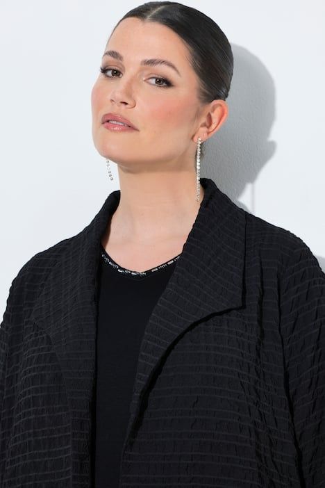 Veste col pelle à tarte et manches 3/4, coupe évasée, contient de la laine