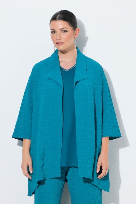 Veste col pelle à tarte et manches 3/4, coupe évasée, contient de la laine