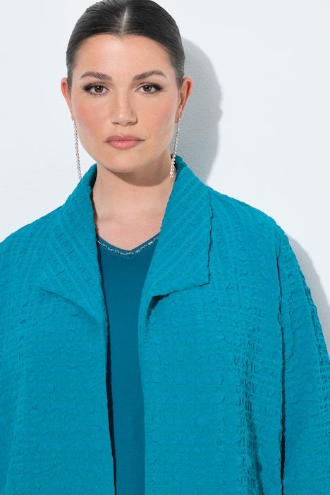 Veste col pelle à tarte et manches 3/4, coupe évasée, contient de la laine