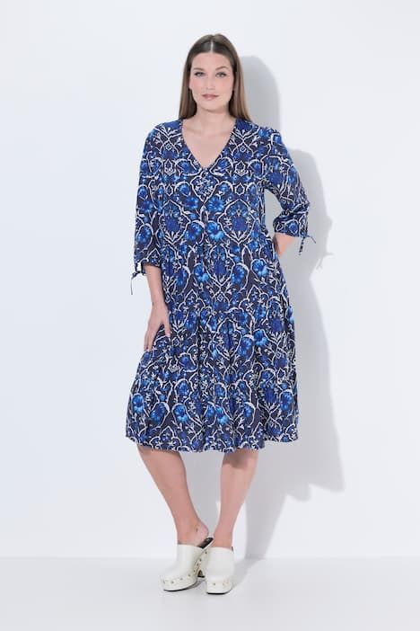 Robe midi à fleurs, poches, décolleté en V et manches 3/4