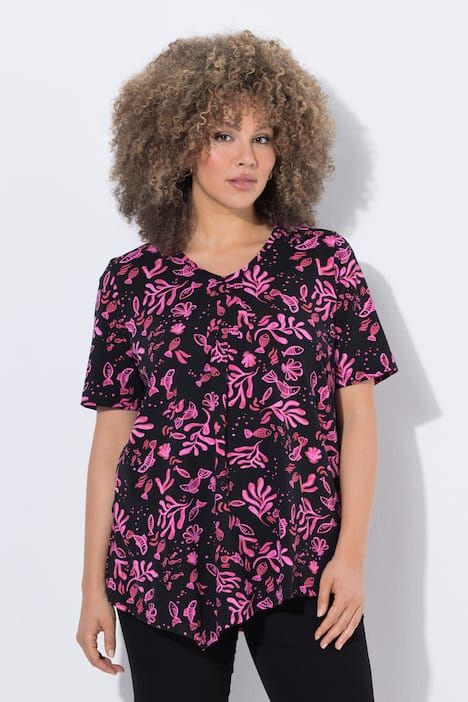 T-shirt à fleurs, base en pointe, décolleté en V et manches courtes