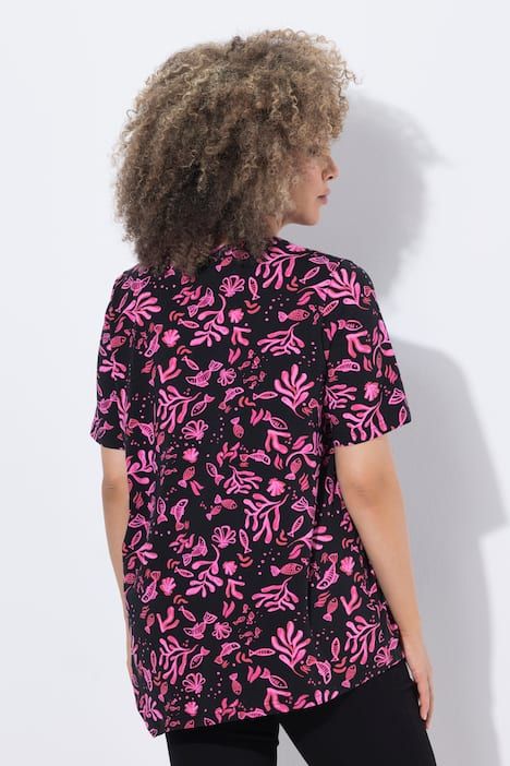 T-shirt à fleurs, base en pointe, décolleté en V et manches courtes