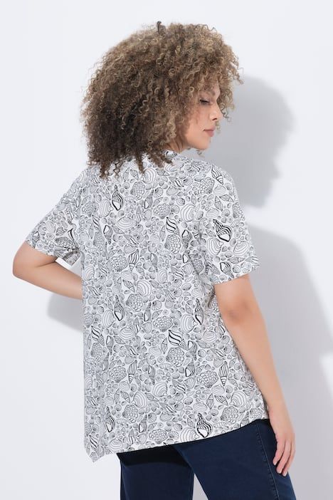 T-shirt à fleurs, base en pointe, décolleté en V et manches courtes