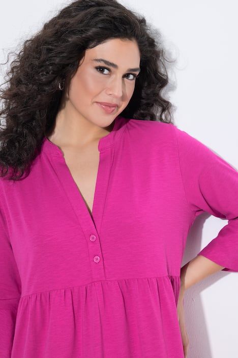 Robe en jersey, coupe évasée, col tunisien et manches 3/4