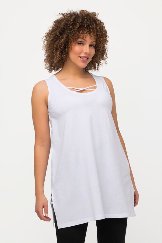 Débardeur long, coupe évasée. Décolleté rond à rubans fantaisie. Bretelles larges