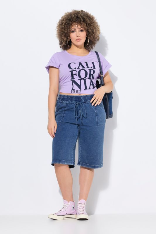 Short Rose en jersey. Jambe large et taille élastique. Teinture indigo