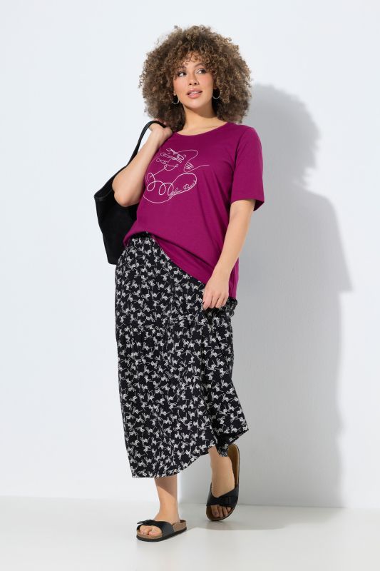 Jupe maxi motif à fleurs, taille élastique et base volantée, coupe évasée