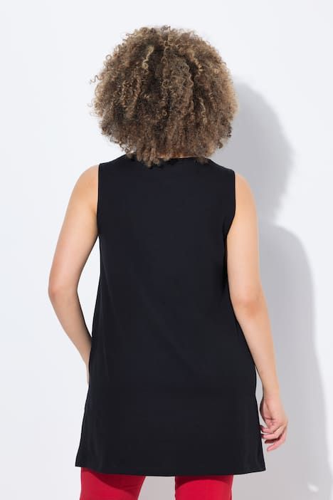 Débardeur long, coupe évasée. Décolleté rond à rubans fantaisie. Bretelles larges