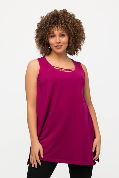 Débardeur long, coupe évasée. Décolleté rond à rubans fantaisie. Bretelles larges