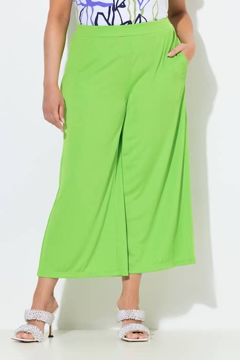 Jupe-culotte en tissu texturé. Taille élastique. Jambe droite, longueur mollet