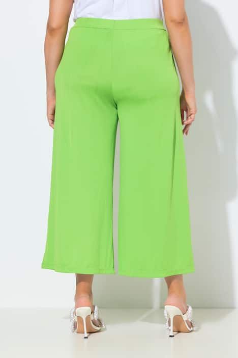 Jupe-culotte en tissu texturé. Taille élastique. Jambe droite, longueur mollet