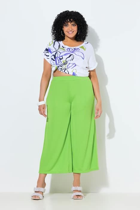 Jupe-culotte en tissu texturé. Taille élastique. Jambe droite, longueur mollet