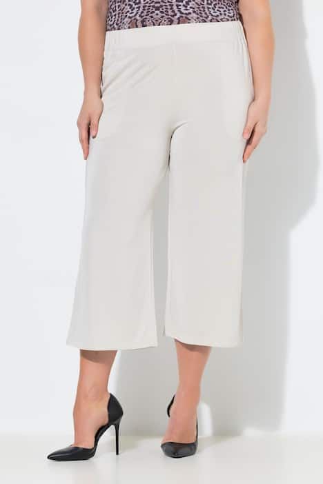 Jupe-culotte en maille fluide. Longueur mollet, jambe large. Taille élastique