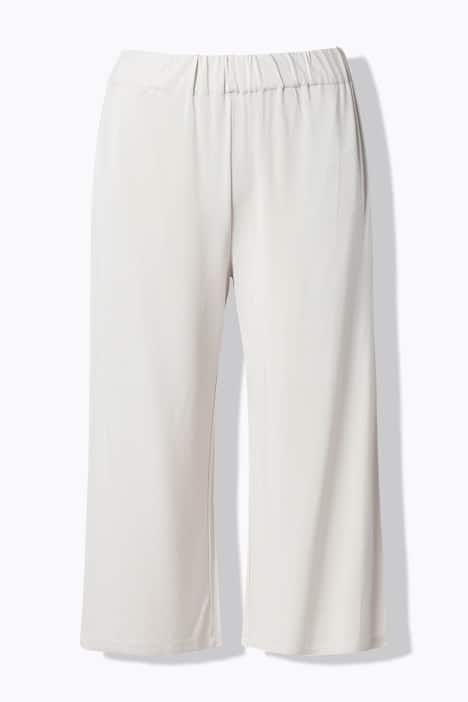 Jupe-culotte en maille fluide. Longueur mollet, jambe large. Taille élastique