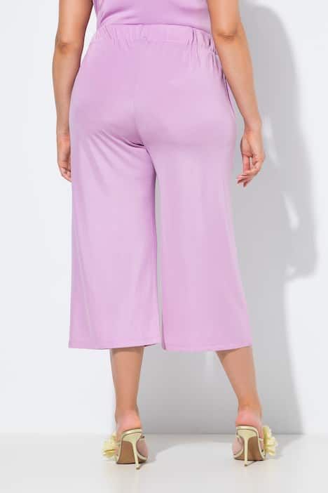 Jupe-culotte en maille fluide. Longueur mollet, jambe large. Taille élastique
