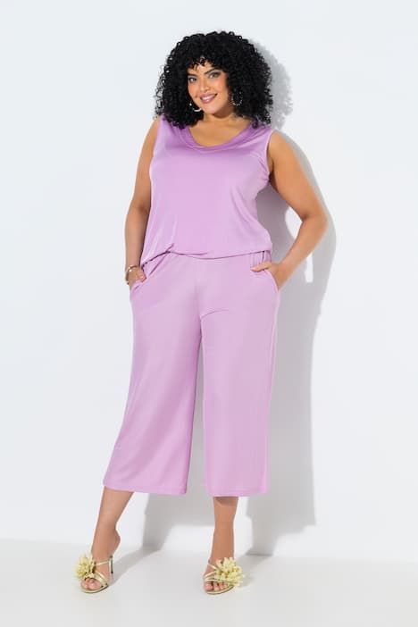 Jupe-culotte en maille fluide. Longueur mollet, jambe large. Taille élastique