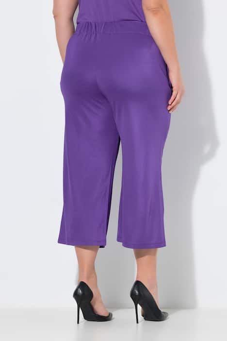 Jupe-culotte en maille fluide. Longueur mollet, jambe large. Taille élastique