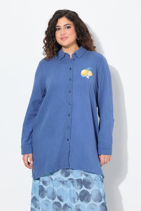 Chemisier en mousseline. Motifs brodés. Coupe évasée