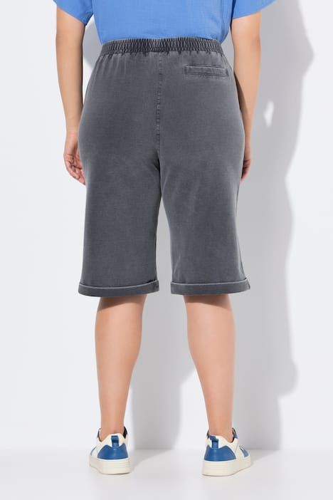 Short Rose en jersey. Jambe large et taille élastique. Teinture indigo