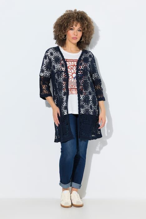 Cardigan, motif floral. Col V et manches longues. Finitions vague