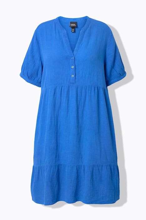 Robe en mousseline. Col tunisien et manches courtes. Coupe évasée