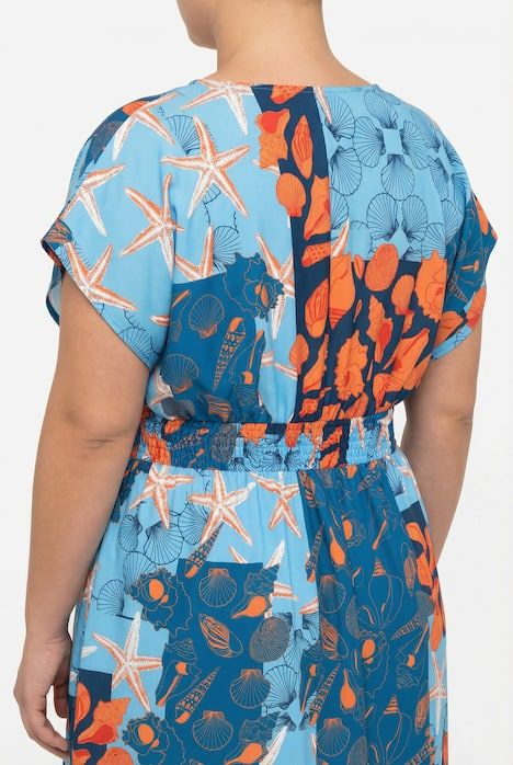 Caftan effet cache-cœur, motif coquillage, ruban à nouer et volant à la base