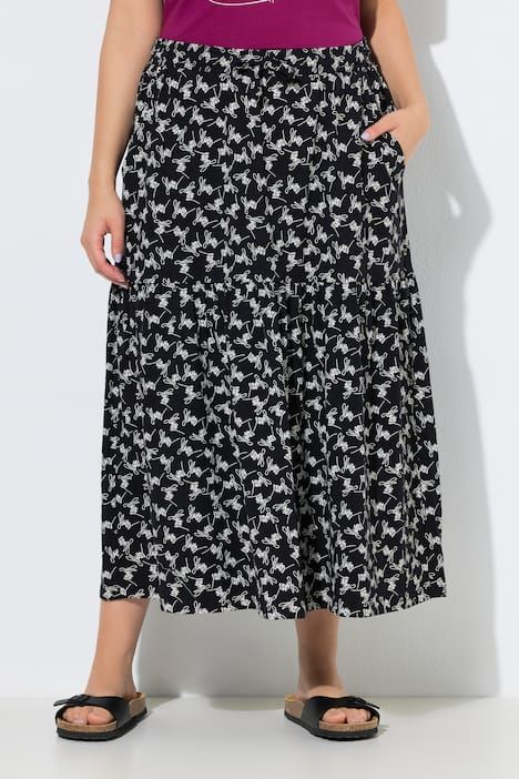 Jupe maxi motif à fleurs, taille élastique et base volantée, coupe évasée