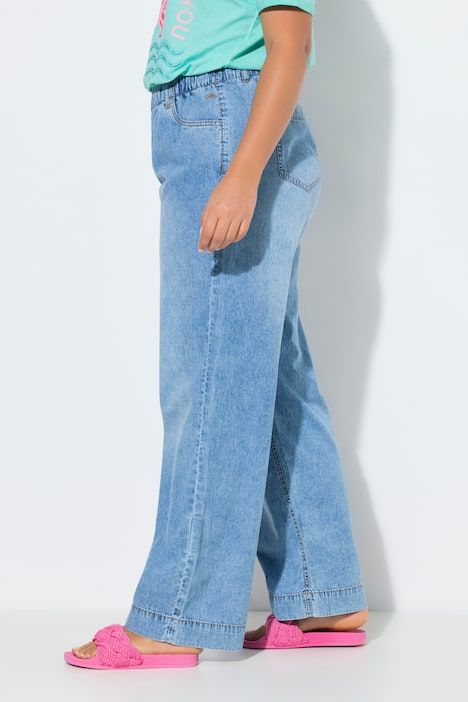 Denim léger, coupe large, ceinture élastiquée