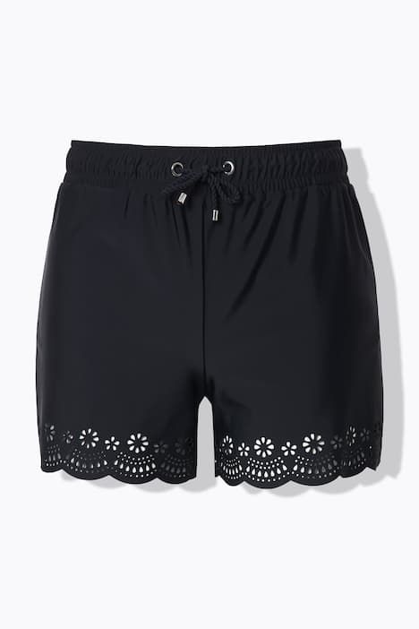 Short de bain à taille élastique. Jambe large et découpes au laser