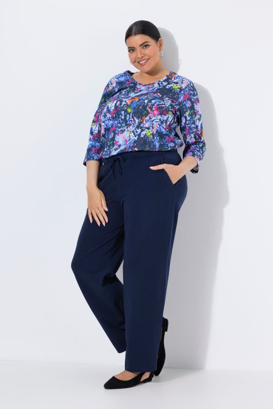 Pantalon en jersey avec jambes droites et poches, jusqu'à la taille 68/70