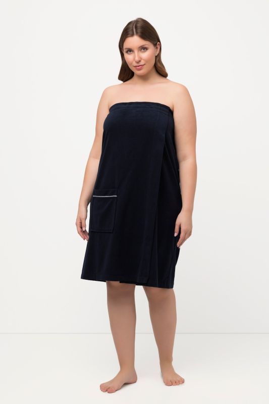 Robe sortie de bain en éponge. Fermeture velcro. Bande élastique dans le dos