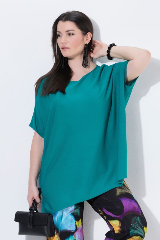 Pull oversize. Encolure bateau et manches chauve-souris