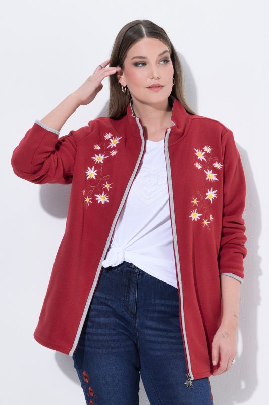 Veste en polaire esprit costume traditionnel bavarois. Fermeture zippée à double sens. Broderies edelweiss