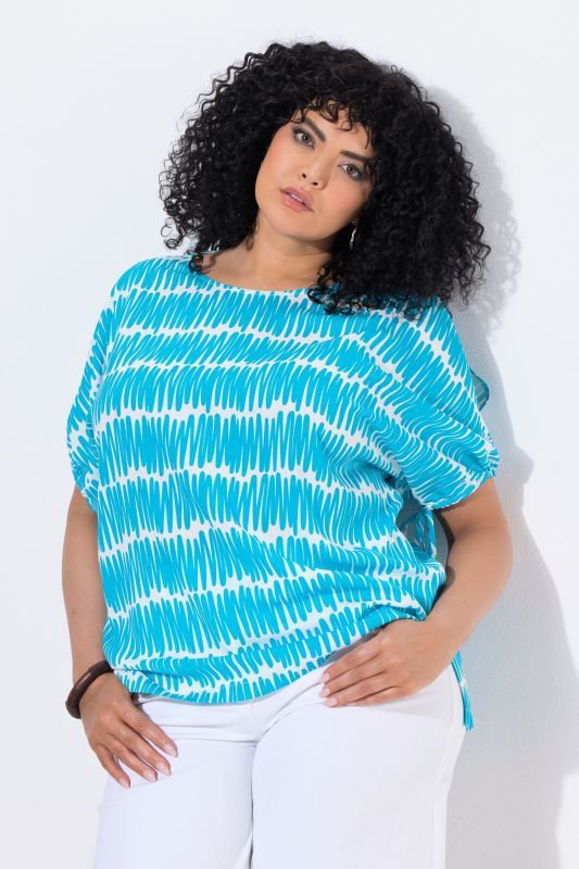 Blouse oversize, encolure bateau et manches courtes