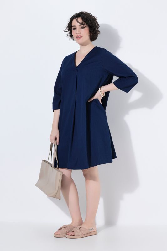 Robe en jersey avec poches et manches 3/4, décolleté en V avec pli fantaisie